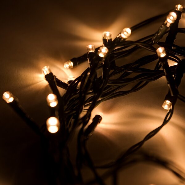 DECOLED LED světýlka na baterie, venkovní, 5,2 m, teple bílá, 50 diod, tmavě zelený kabel, IP44, ovladač, 4 × AA