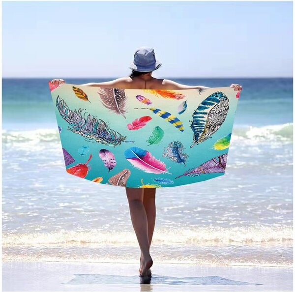 Plážová osuška s motivem barevných pírek 100 x 180 cm