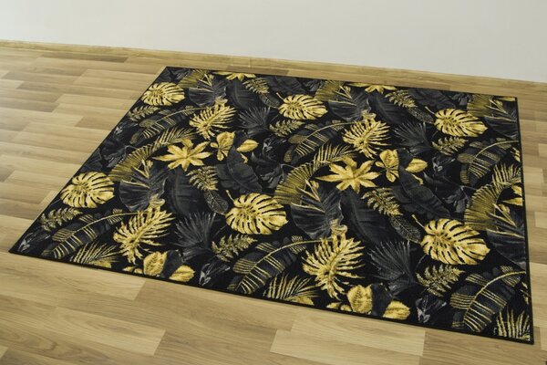 Kobercový ráj Kusový koberec Monstera Listy palmy černý zlatý Rozměr: 100x150 cm