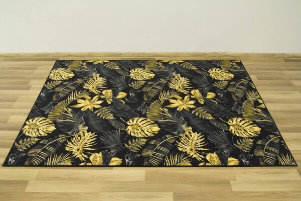 Kobercový ráj Kusový koberec Monstera Listy palmy černý zlatý Rozměr: 100x150 cm