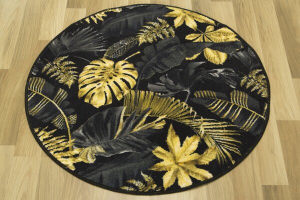 Kobercový ráj Kulatý koberec Monstera listy palmy černý zlatý Rozměr: průměr 80 cm