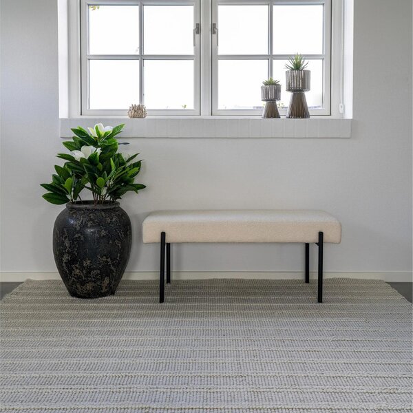 Nordic Living Krémově bílá bouclé lavice Swipper 100 cm