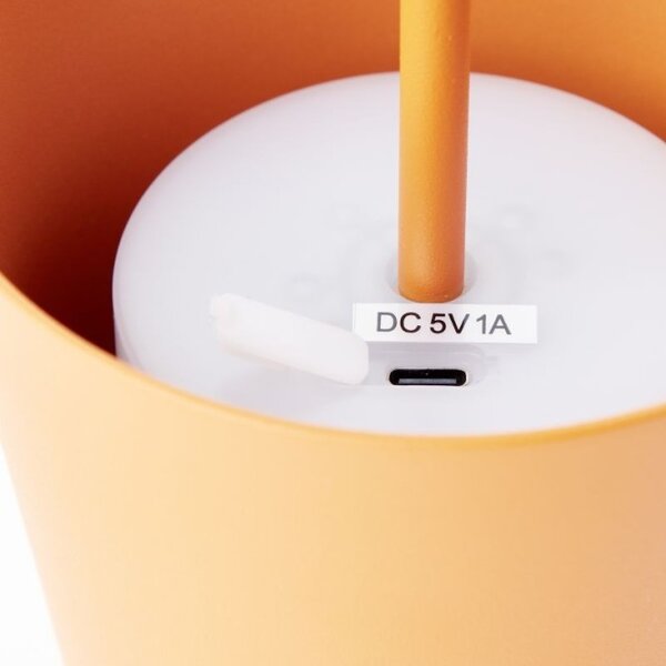 Brilliant G90939/77 Venkovní AKU stolní lampa KAAMI oranžová USB-C