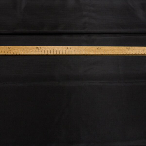 Podšívka polyesterová 54/917 jednobarevná černá, š.150cm (látka v metráži)