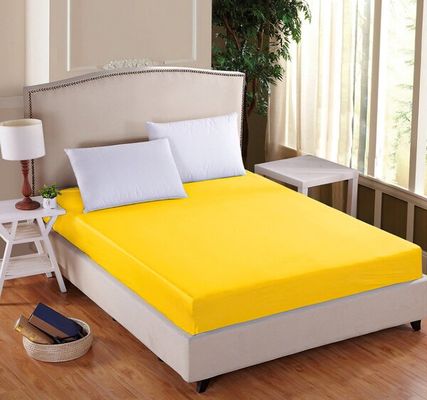 TextilCentrum Luxusní napínací mako-jersey prostěradlo s lycrou do postýlky DELUXE Collection 60x120cm / 20cm elastické, sytě žluté