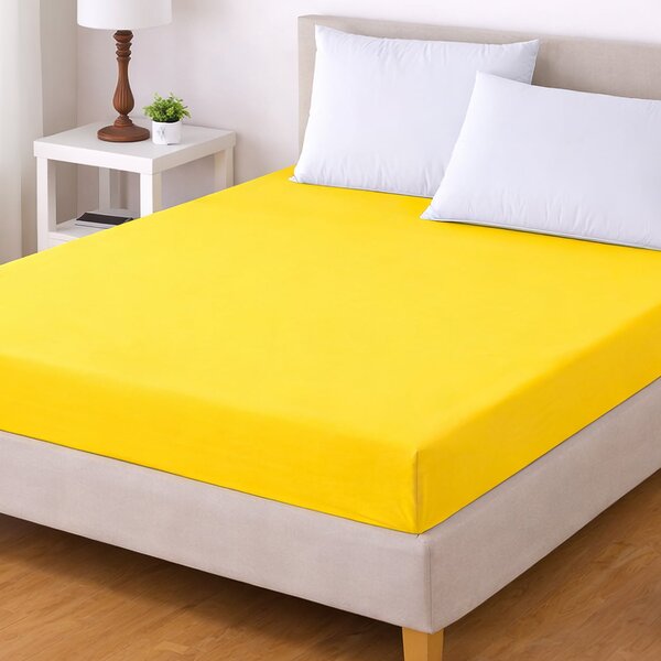 TextilCentrum Luxusní napínací mako-jersey prostěradlo s lycrou do postýlky DELUXE Collection 60x120cm / 20cm elastické, sytě žluté