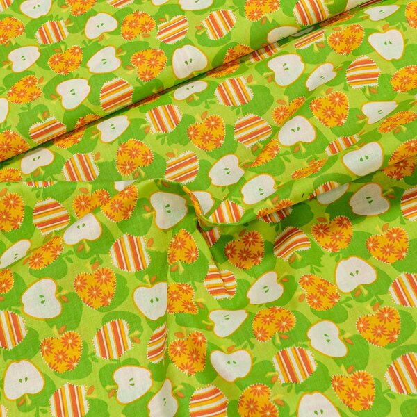 Bavlněné plátno oranžová jablíčka na zelené, š.140cm (látka v metráži)