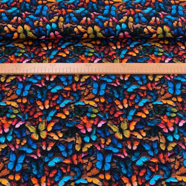 Bavlněný úplet DIGITÁLNÍ TISK 6-10024, barevní motýli na černé, š.145cm (látka v metráži)