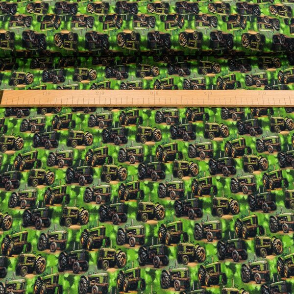 Bavlněný úplet dětský TEPLÁKOVINA 6-00824 DIGITÁLNÍ TISK traktory na zelené, š.140cm (látka v metráži)