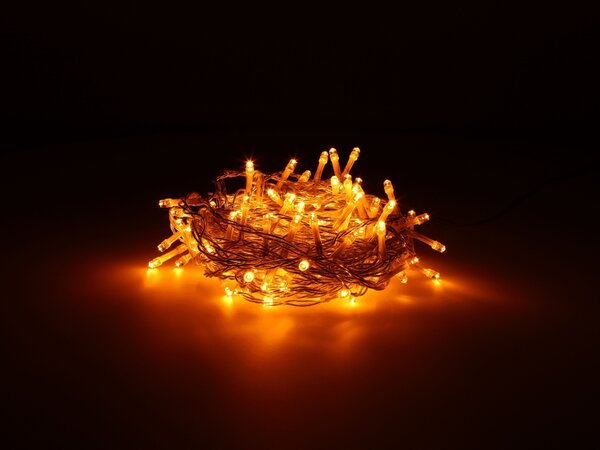 TESLA lighting Tesla - dekorativní řetěz, AMBER, 100LED, 10m + 5m kabel, 230V, 8 funkcí, IP44, transparentní