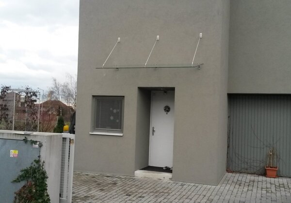 Strisky-polymer.cz Skleněná stříška nad dveře s táhly,hl.100cm 180 cm čiré sklo 10mm ESG