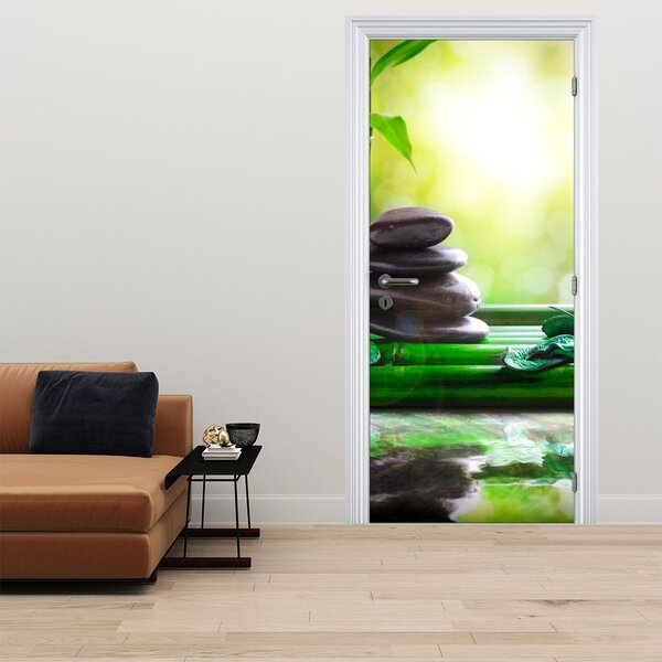 Fototapeta na dveře - Masážní kameny a orchidej na vodě (95x205cm)