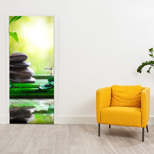 Fototapeta na dveře - Masážní kameny a orchidej na vodě (95x205cm)