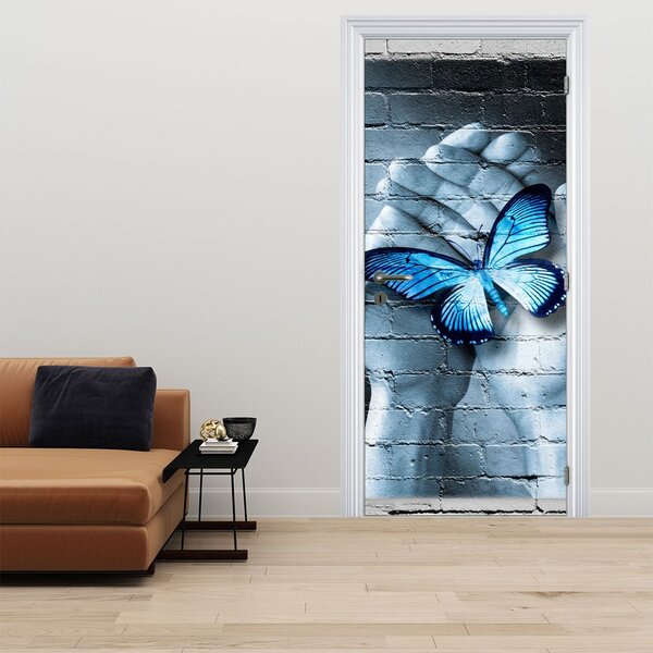 Fototapeta na dveře - Modrý motýl na zdi (95x205cm)