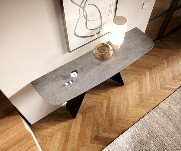 DELIFE Konzolový stůl Edge oválný tvar 140×40 cm keramika beton šedá Velio kov černá