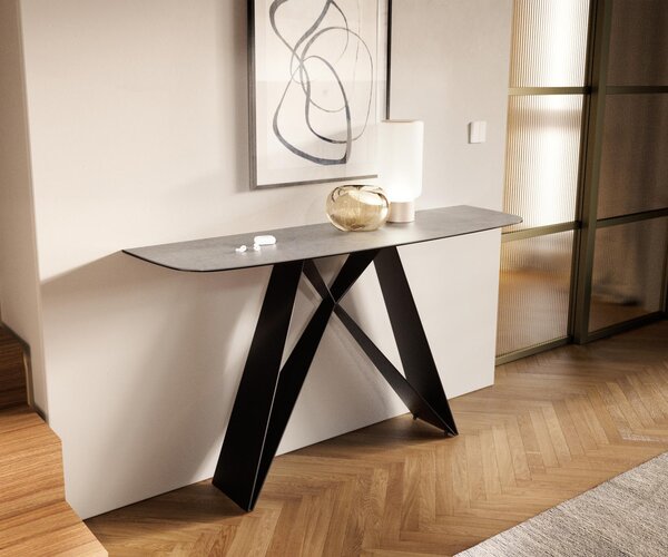 DELIFE Konzolový stůl Edge oválný tvar 140×40 cm keramika beton šedá Velio kov černá