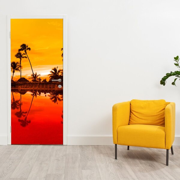 Fototapeta na dveře - Západ slunce nad resortem (95x205cm)