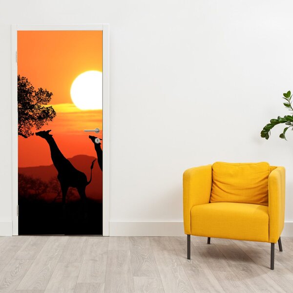 Fototapeta na dveře - Žirafy při západu slunce (95x205cm)