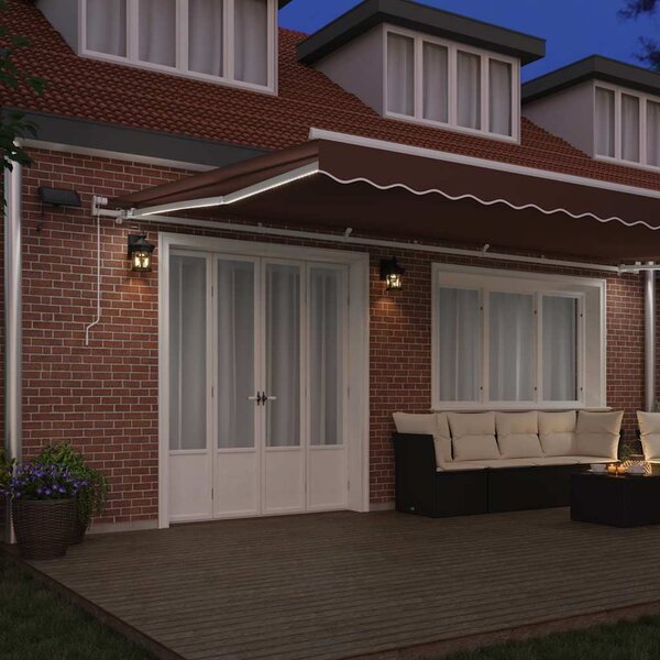 Ručně zatahovací markýza s LED hnědá 600 x 300 cm 3215385