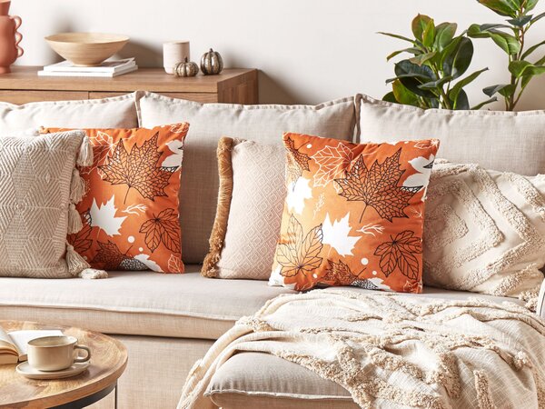 Sada 2 dekorativních polštářů POINSETTIA Umělý samet 45 x 45 cm Oranžová Rostlinný vzor