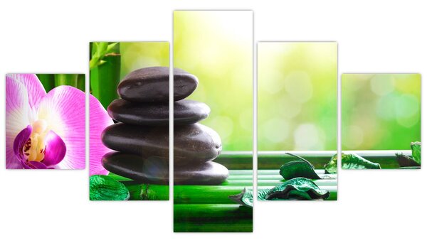 Obraz masážních kamenů a orchidee na vodě (125x70 cm)