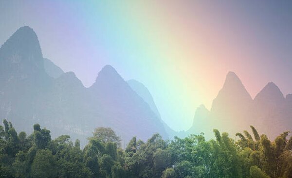 Fotografie View of rainbow by mountains., Grant Faint, (40 x 24.6 cm)