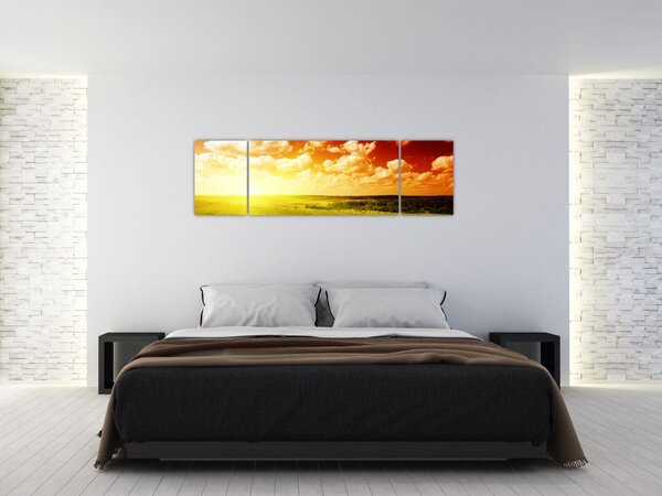 Obraz louky se zářícím sluncem (170x50 cm)