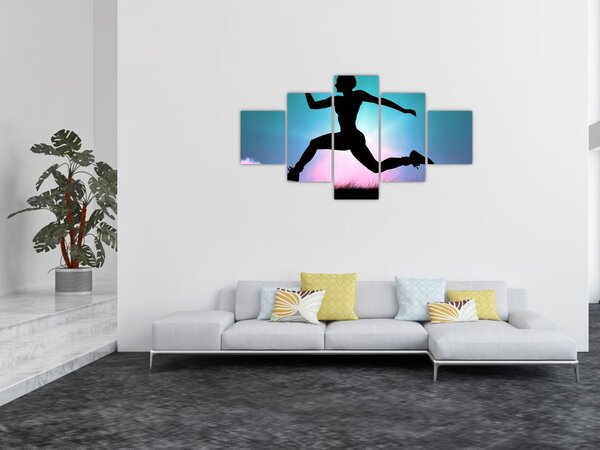 Obraz skákající siluety ženy (125x70 cm)