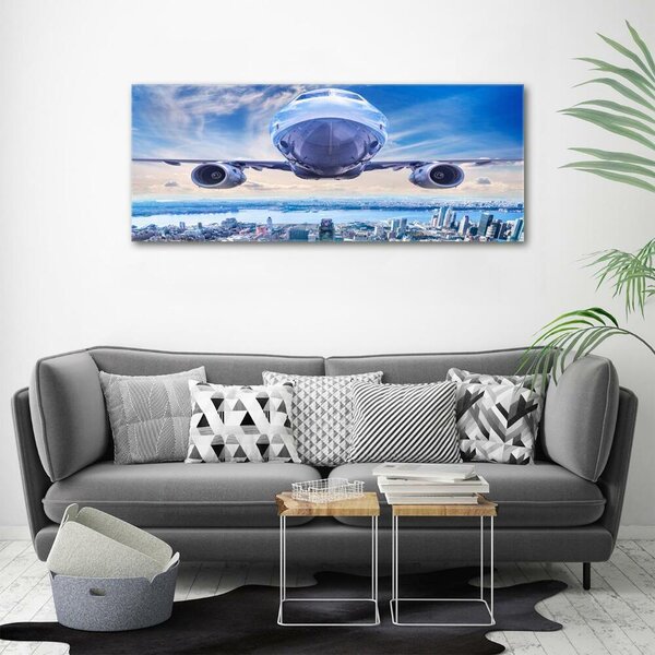 Moderní skleněný obraz z fotografie Letadlo na městem osh-167779538