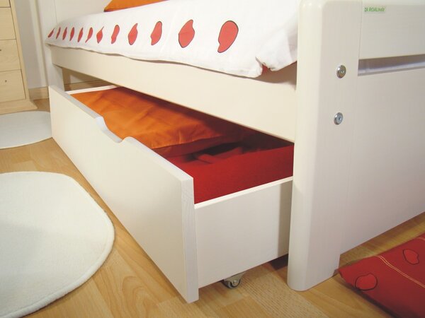 Bílý úložný prostor masiv REMI 1/2 pod bílé postele (bílý půlený úložný prostor s kolečky)