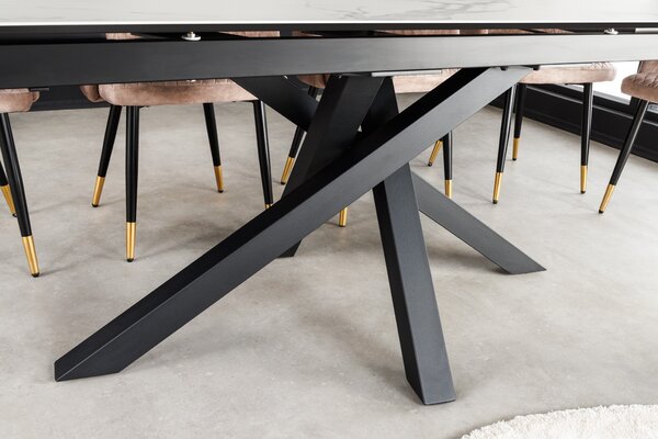 Rozkládací obdélníkový jídelní stůl Ceramia s bílou deskou s designem mramoru as černýma zkříženýma nohama 180 cm