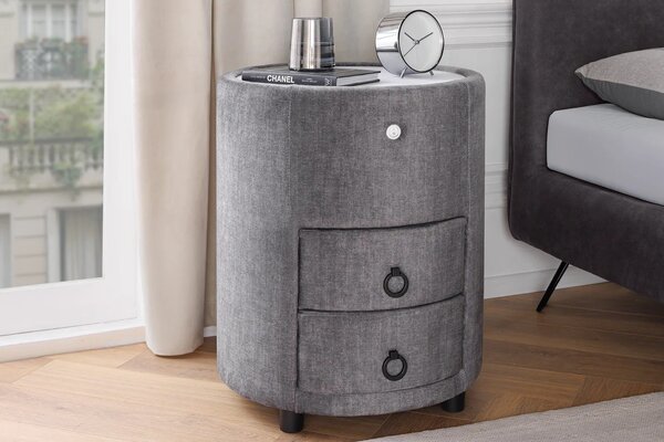 Art deco designový noční stolek Aluro se dvěma šuplíky s šedým sametovým potahem a kulatou bílou deskou s podvícením 55 cm