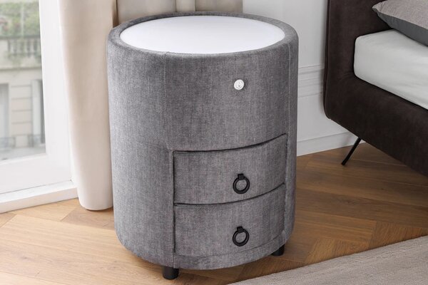Art deco designový noční stolek Aluro se dvěma šuplíky s šedým sametovým potahem a kulatou bílou deskou s podvícením 55 cm