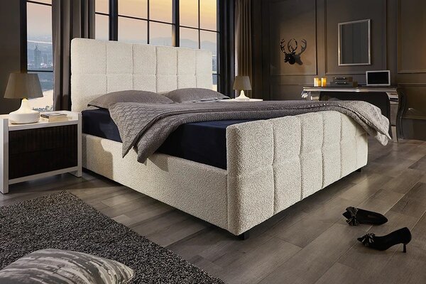 Designová art deco manželská postel Zenni s buklé potahem v krémové barvě se čtvercovým prošíváním a úložným prostorem 190 cm