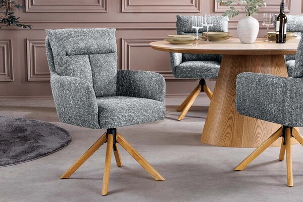 Moderní otočná čalouněná zelená jídelní židle Dover s dubovou hnědou podnoží a žinylkovým potahem 92 cm