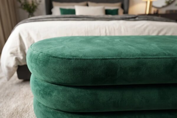 Designová glamour oválná lavice Eliana s čalouněním a sametovým potahem ve smaragdové zelené barvě s úložným prostorem 85 cm