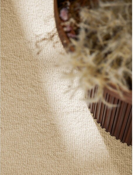 Béžový ručně tkaný vlněný kulatý koberec ø 160 cm Puristic Knots – Elle Decoration
