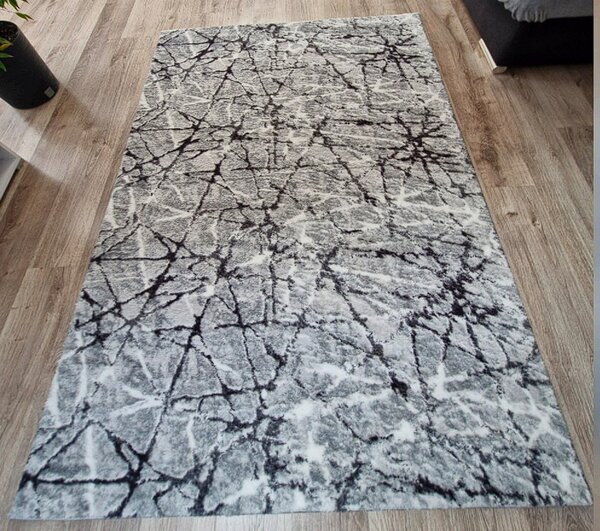 HU Šedý koberec Plush Deluxe Šedý mramor Rozměr: 50x80 cm
