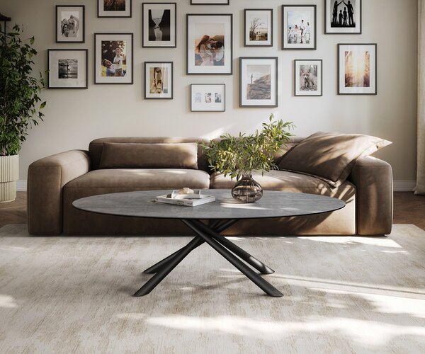 DELIFE Konferenční stolek Edge oválný 140×80 cm keramika beton šedá Sarity kov černá