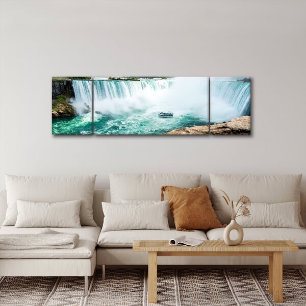 Obraz vodopádů s lodí (170x50 cm)