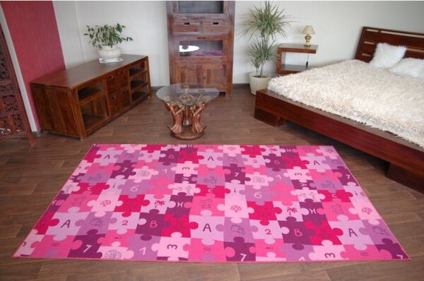 Dětský metrážový koberec Puzzle fialový