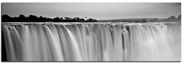 Obraz na plátně - Vodopád zbarvený západem slunce - panoráma 5227QA (105x35 cm)
