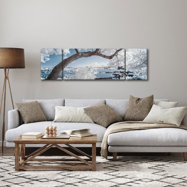 Obraz zasněženého stromu u vody (170x50 cm)