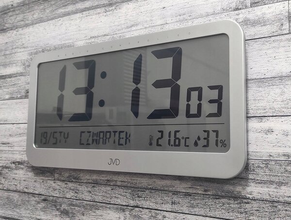 Nástěnné hodiny JVD RB9359.2 řízené rádiovým signálem DCF, s teploměrem a ukazatelem dne v týdnu PL