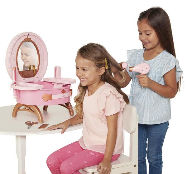 Sada cestovní toaletky s princeznami od společnosti Jakks Pacific, včetně zrcátka a příslušenství pro úpravu vlasů