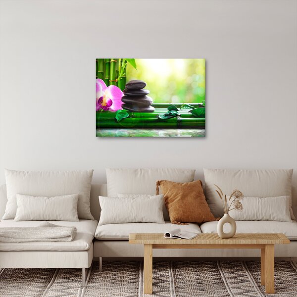 Obraz masážních kamenů a orchidee na vodě (70x50 cm)