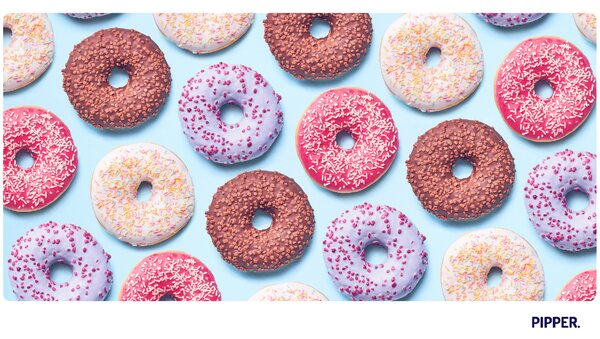 PIPPER. Samolepící textilní tapeta "Donuts"
