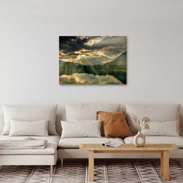 Obraz jezera s průsvitajícím sluncem (70x50 cm)