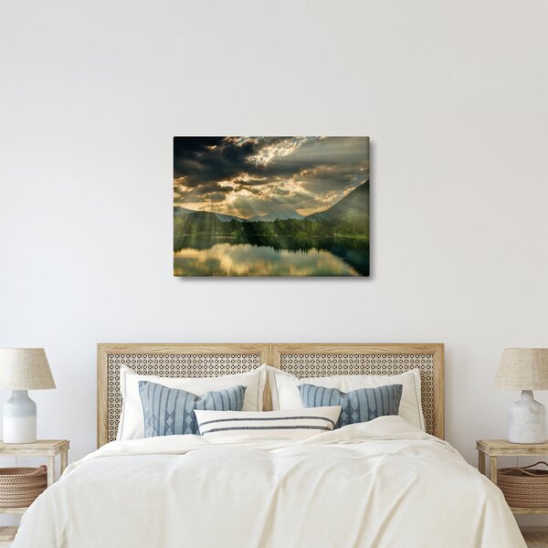 Obraz jezera s průsvitajícím sluncem (70x50 cm)