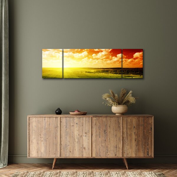 Obraz louky se zářícím sluncem (170x50 cm)